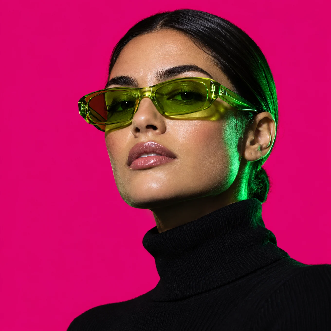 Woman in lime-tinted sunglasses and a black turtleneck against hot magenta